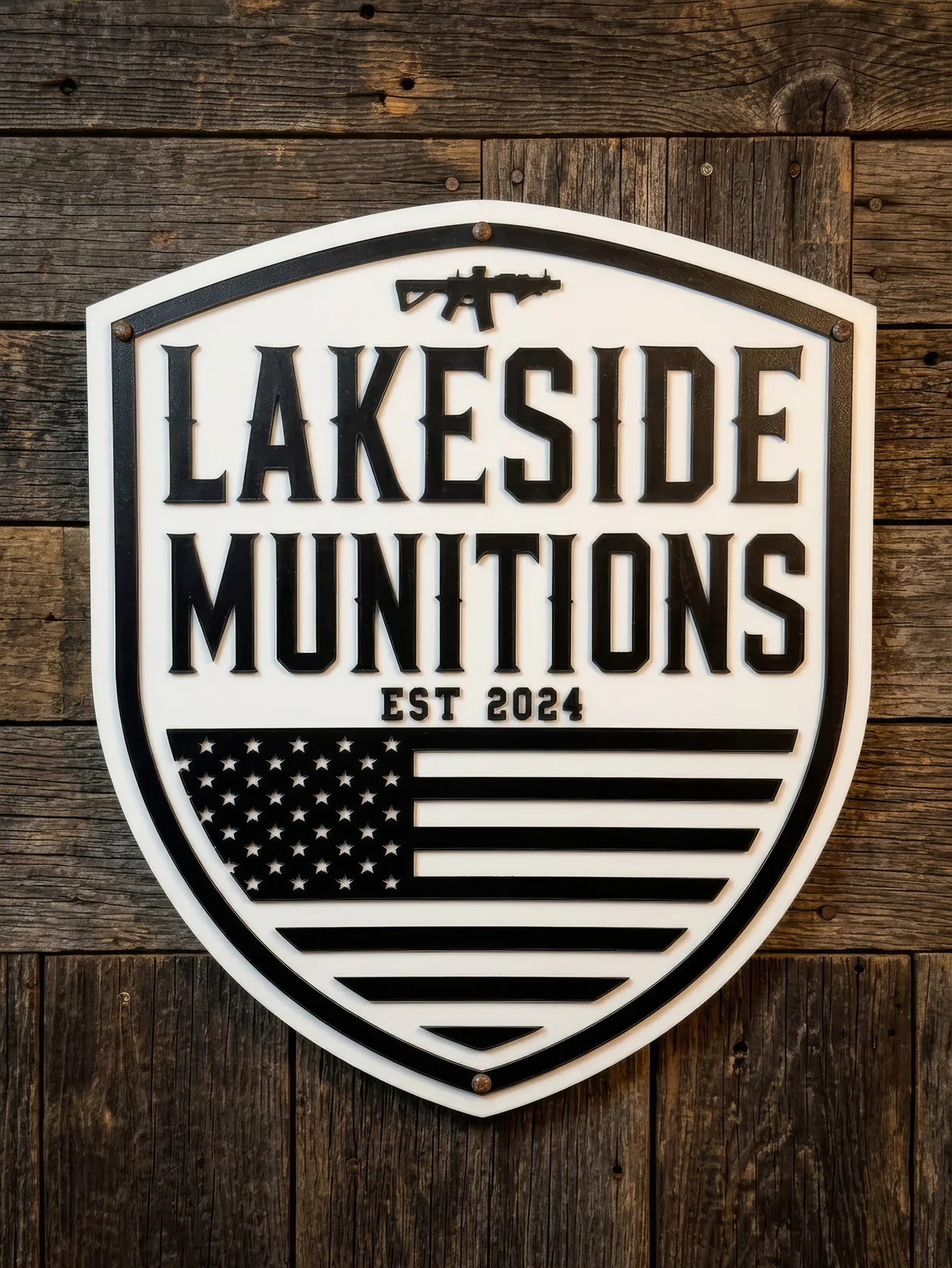 Lakeside Munitions logo sign on a wood wall